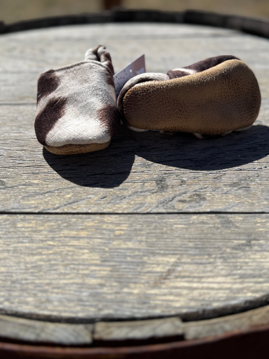 Faux Cowhide Infant Moccasins
